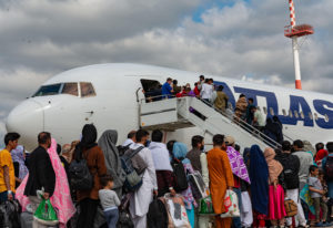 Evacuees loading plane