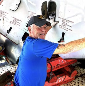 Joe performing an aircraft maintenance check