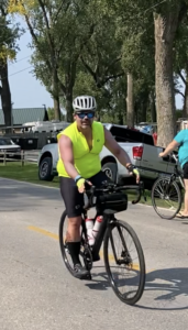 Atlas employee rides bike