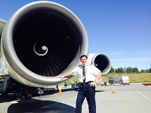 Atlas Air Captain Bob Chisholm standing next to a 747-200 “Classic”